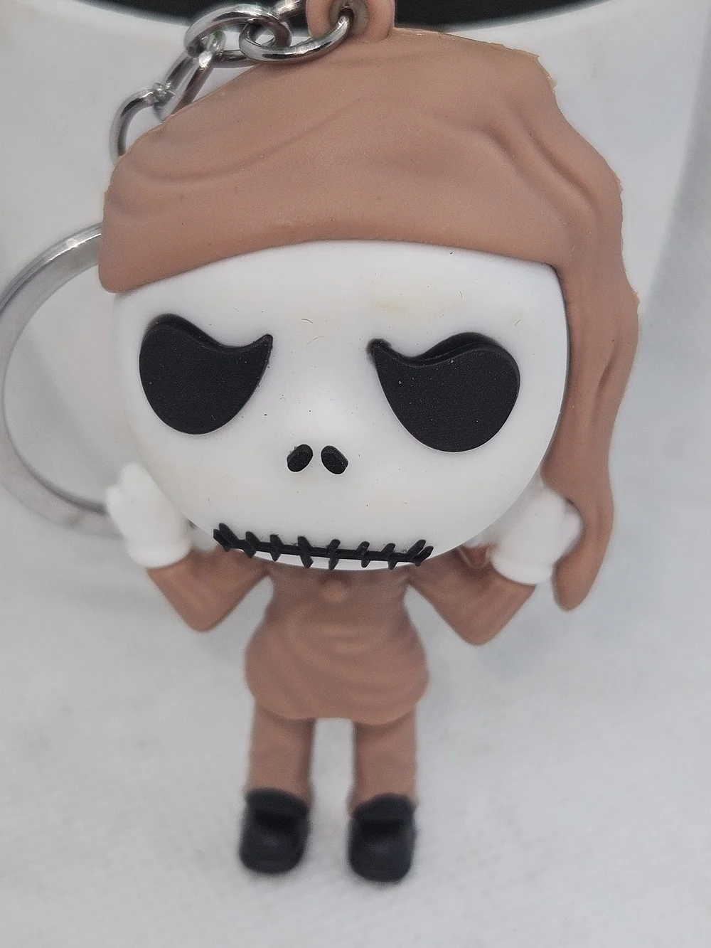 Novelty Skull Character Keychain in Tan and White
